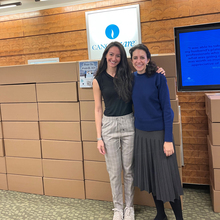 Social workers standing in front of boxes